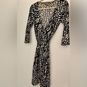 Women’s wrap dress by Lily. Size Small. Excellent condition! 3/4 sleeves